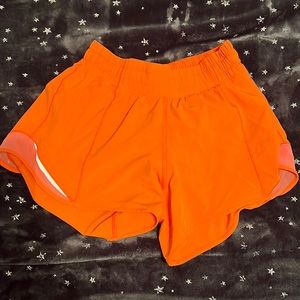 Orange lulu shorts size 4